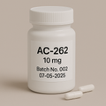 White pill bottle labeled 'AC-262 10 mg' with capsules on a beige background