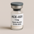 Glass vial labeled 'ACE-031 1 mg, Batch No.004, 18-05-2025' containing a white lyophilized powder, sealed with a gray rubber stopper and matte silver cap, placed against a soft beige background.