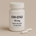 A digital photograph of a white plastic pill bottle labeled 'GW-0742, 10 mg, Batch No.004, 10-08-2025,' with two white capsules lying in front on a beige surface, minimalistic neutral background.