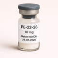 PE-22-28 10 mg peptide vial with white lyophilized powder, labeled Batch No.006, dated 27-01-2026, pharmaceutical glass vial with rubber stopper and metal seal.