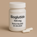 A clean, high-resolution digital photograph features a white plastic supplement bottle labeled “Bioglutide 100 mg, Batch No.002, 24-09-2025” in black text. The bottle is positioned upright on a neutral beige background with two cream-colored capsules placed beside it.