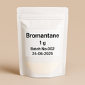 A resealable white pouch labeled “Bromantane 1 g, Batch No. 002, 24-06-2025” stands upright on a beige background.