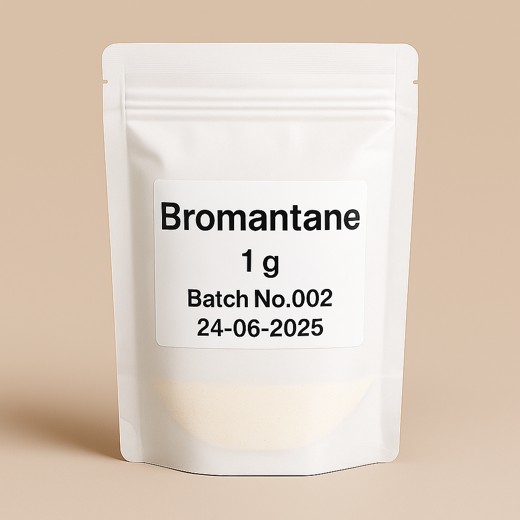 A resealable white pouch labeled “Bromantane 1 g, Batch No. 002, 24-06-2025” stands upright on a beige background.