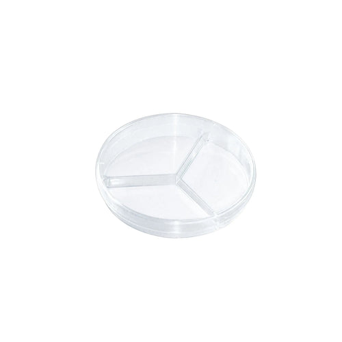 Clear plastic compartmentalized dish on a white background