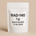 A digital photograph of a white resealable pouch labeled “RAD-140, 1 g, Batch No.002, 11-05-2025.” The minimalist design features bold black typography on a clean beige background, emphasizing a professional and modern supplement package presentation