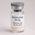 Retatrutide 30 mg vial containing white powder, labeled Batch No. 008 and expiration date 09-03-2026, in a clear glass vial with a gray cap on a neutral background.