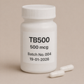 TB500 500 mcg peptide capsules in white plastic bottle, labeled Batch No.004, dated 19-01-2026, ribbed screw cap bottle on beige background